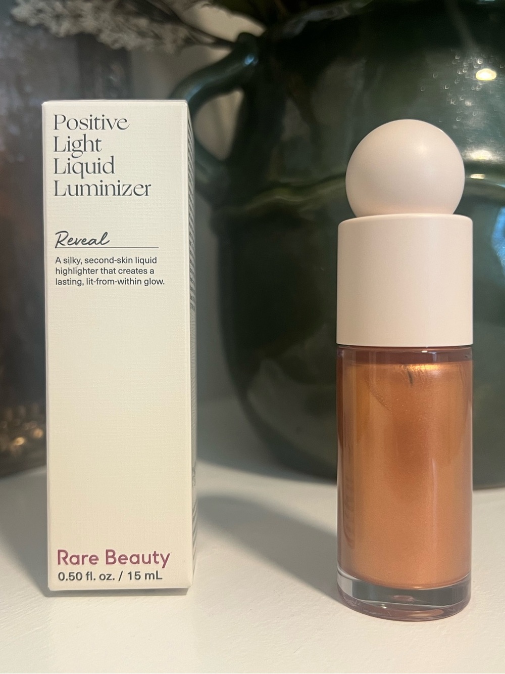 Rare Beauty Positive Light Liquid Luminizer — Reveal (Warm Copper Shimmer)